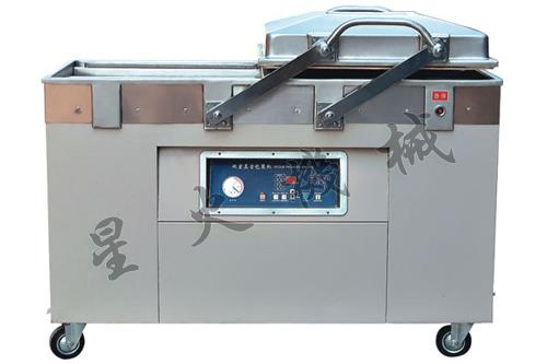廣州包裝機(jī)/包裝機(jī)械/牛肉干真空包裝-500雙室真空包裝機(jī)